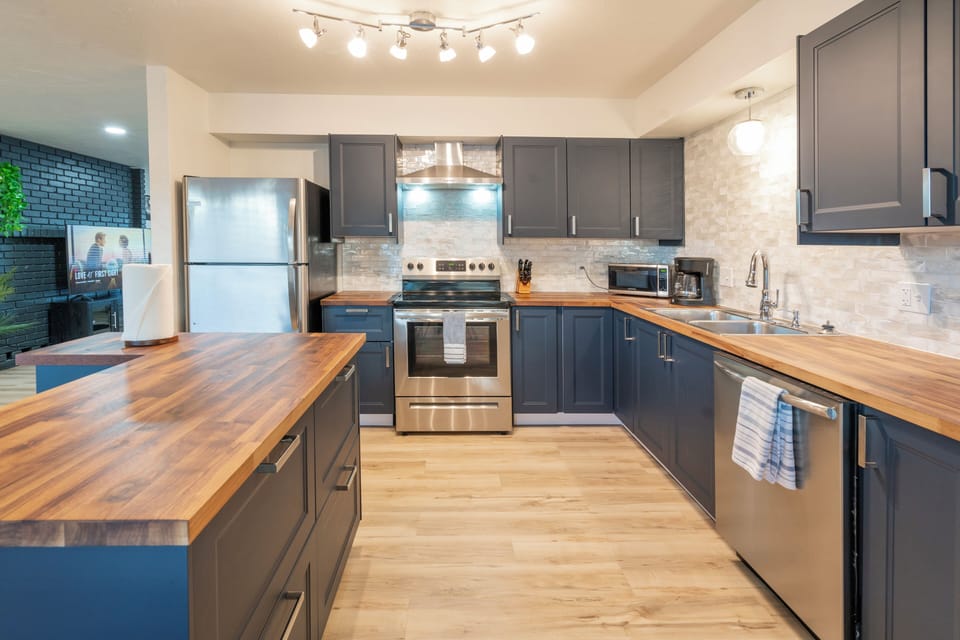 Full kitchen with coffee maker, dishwasher, pots & pans for cooking..