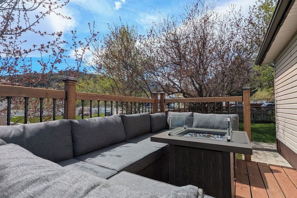 Kick back and relax on this cozy deck! With comfortable sectional seating and a warm natural gas fire table, it's the perfect spot to unwind after a day of exploring. Enjoy the fresh air and peaceful ambiance in this lovely outdoor space.