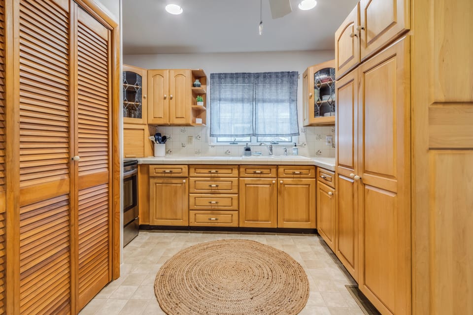 Stocked Kitchen with Dishes, Cups, Silverware, Toaster, Blender, Mixer, and more
