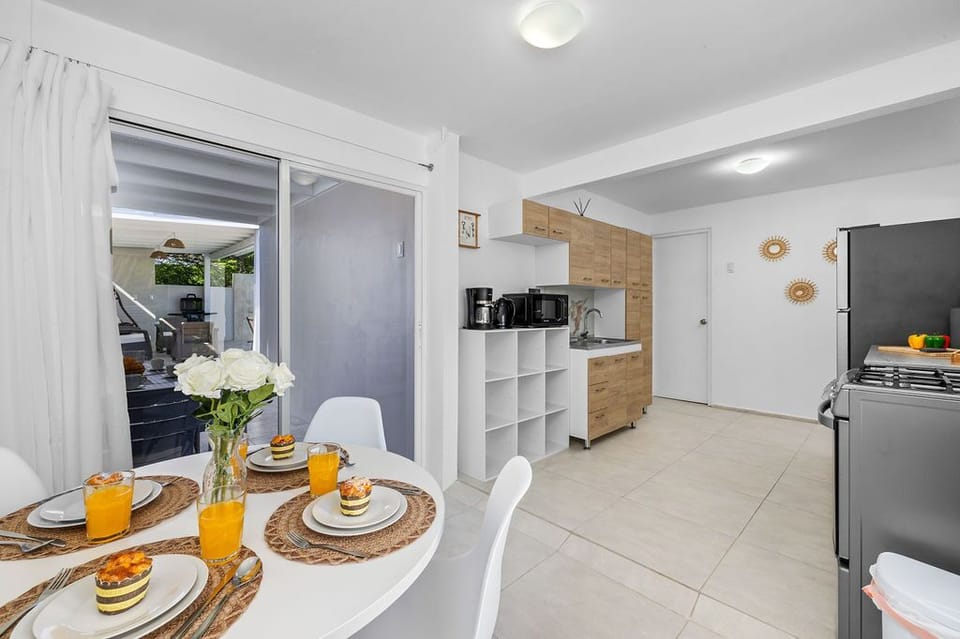 Gather and enjoy memorable meals in the stylish dining area, designed to offer both comfort and elegance.