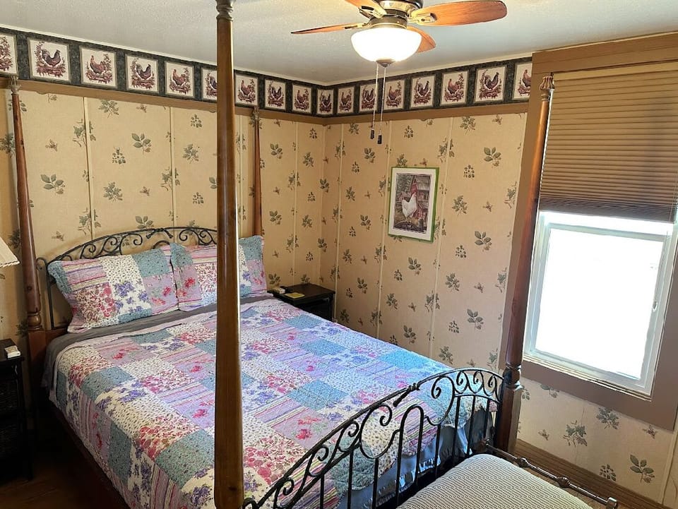 Thelma’s bedroom with queen bed