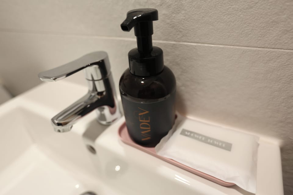 Shower, hair dryer, bathrobes, towels