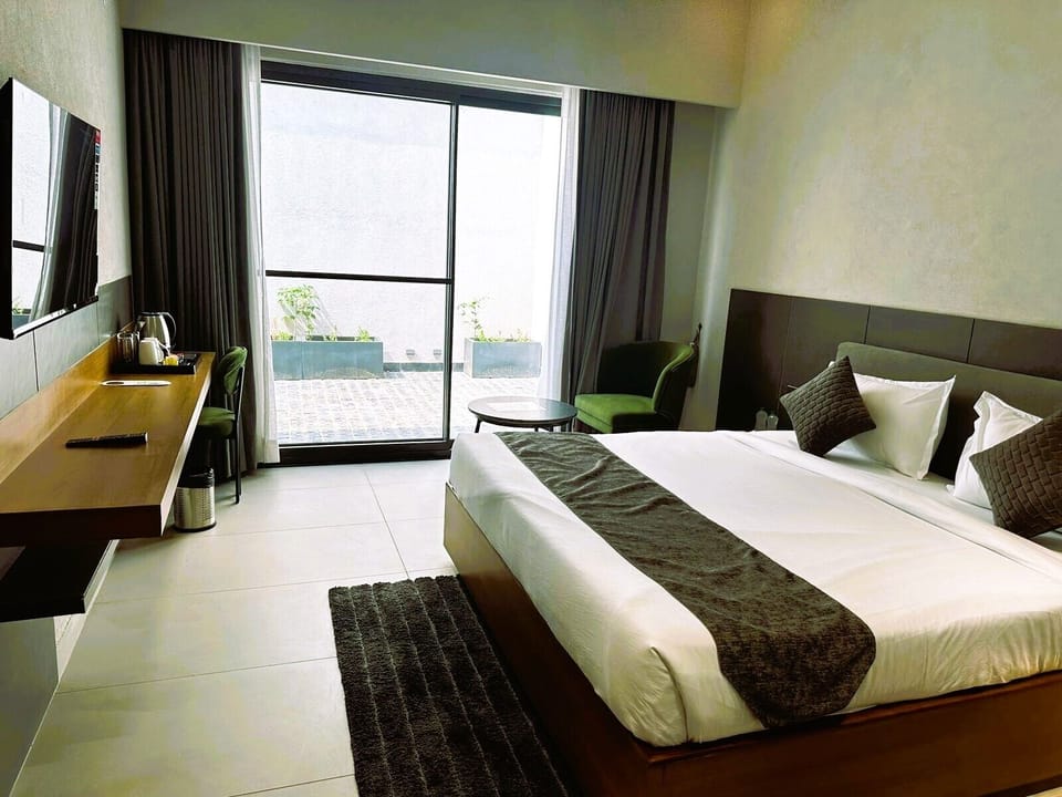Double Room, City View | In-room safe, iron/ironing board, free WiFi