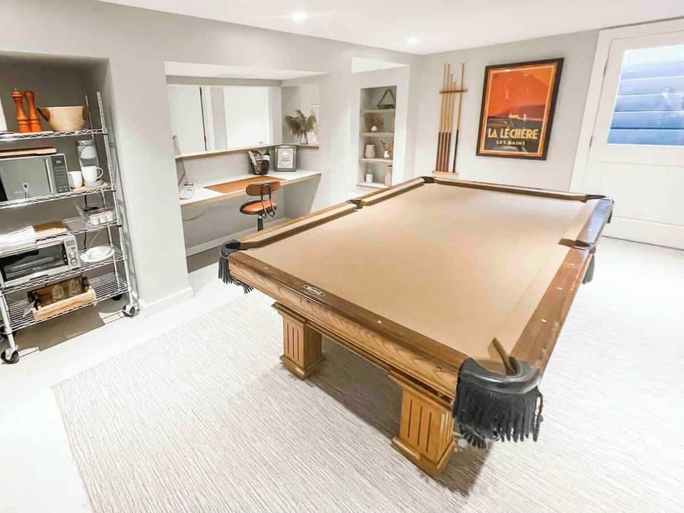 Pool table, workstation and kitchenette