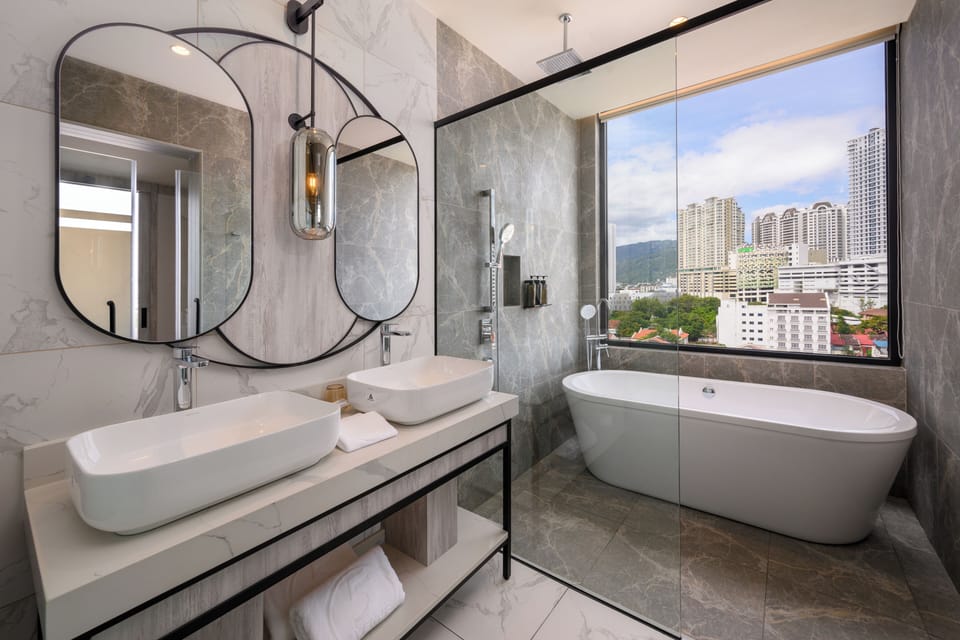 The Magazine Suite | Bathroom | Shower, rainfall showerhead, free toiletries, hair dryer