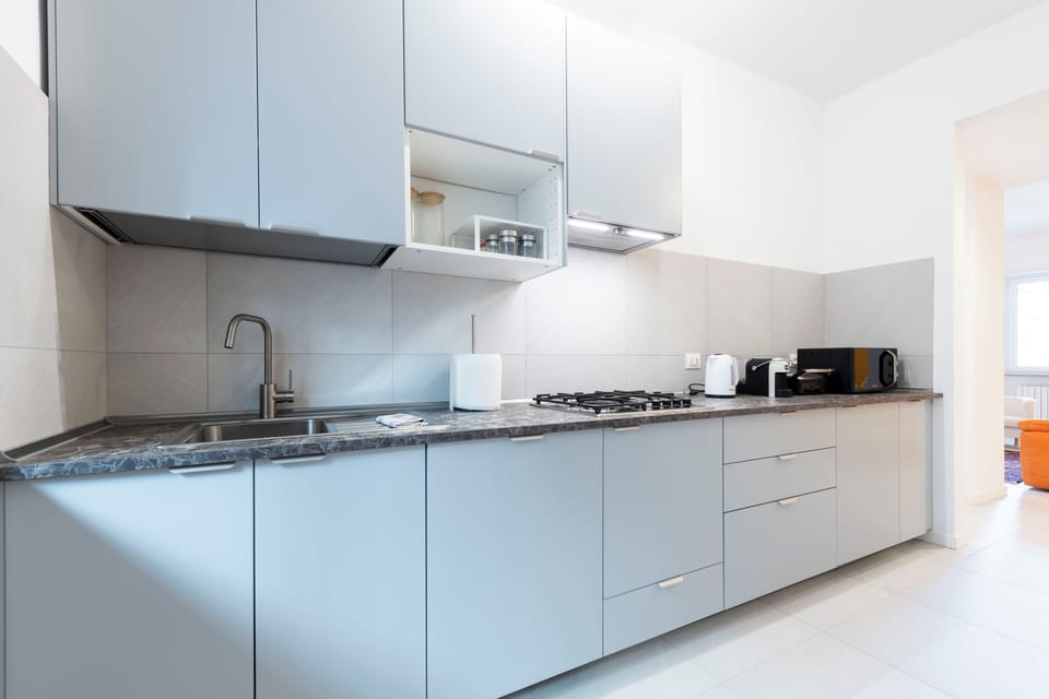 Comfort Apartment, River View | Private kitchen | Electric kettle
