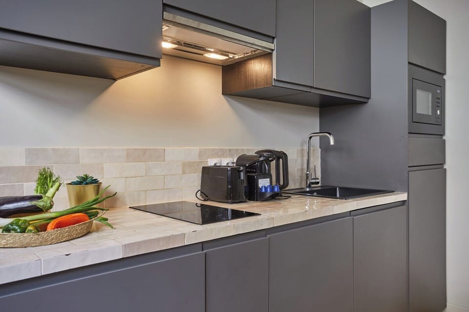 Apartment | Private kitchen | Cleaning supplies