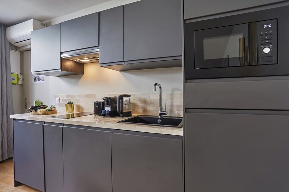 Apartment | Private kitchen | Cleaning supplies