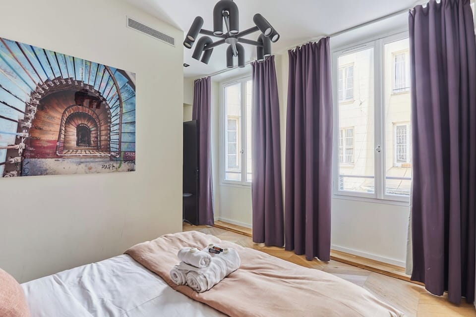 Apartment | Laptop workspace, iron/ironing board, bed sheets