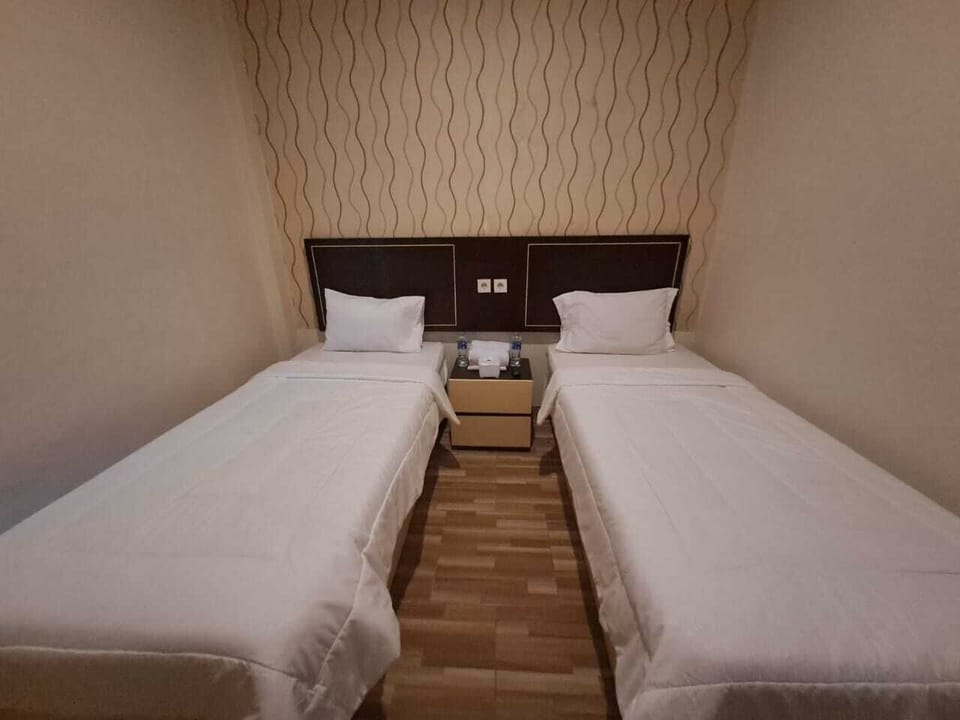 Deluxe Twin Room | Bed sheets