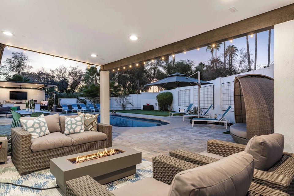 Spacious patio with a sparkling pool, offering the perfect blend of relaxation and open-air enjoyment