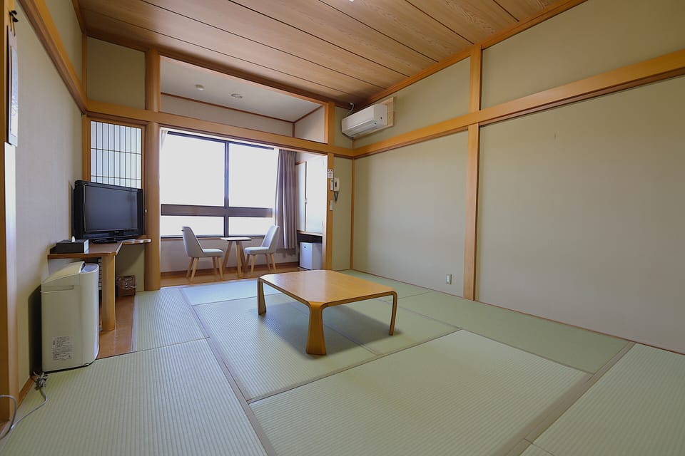 Comfort Quadruple Room, Non Smoking, Mountain View | Desk, laptop workspace, free WiFi