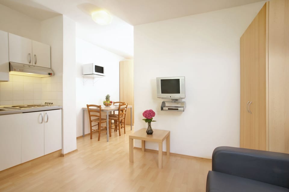 Sunset Apartment for 2+1 Seaside | Living area | 0-inch TV with satellite channels
