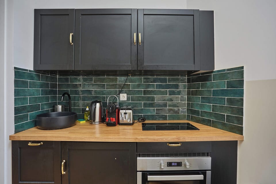Apartment | Private kitchen | Cleaning supplies