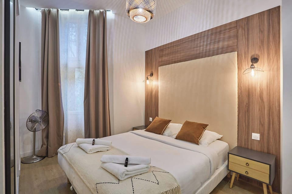 Apartment | Laptop workspace, iron/ironing board, bed sheets