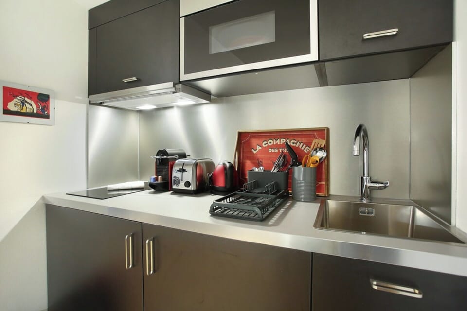 Apartment | Private kitchen | Cleaning supplies