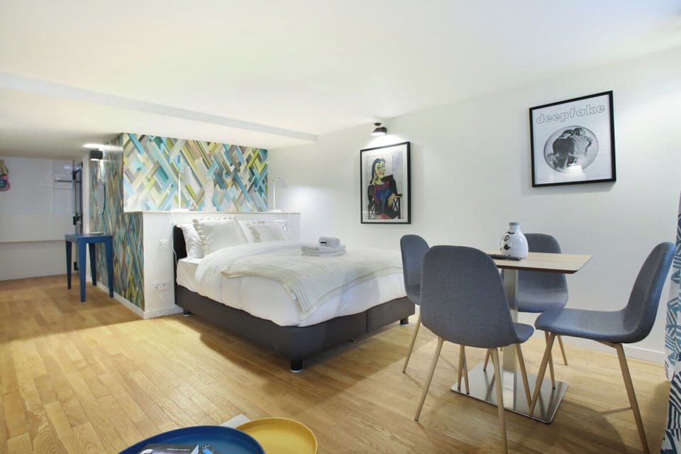 Apartment | Laptop workspace, iron/ironing board, bed sheets