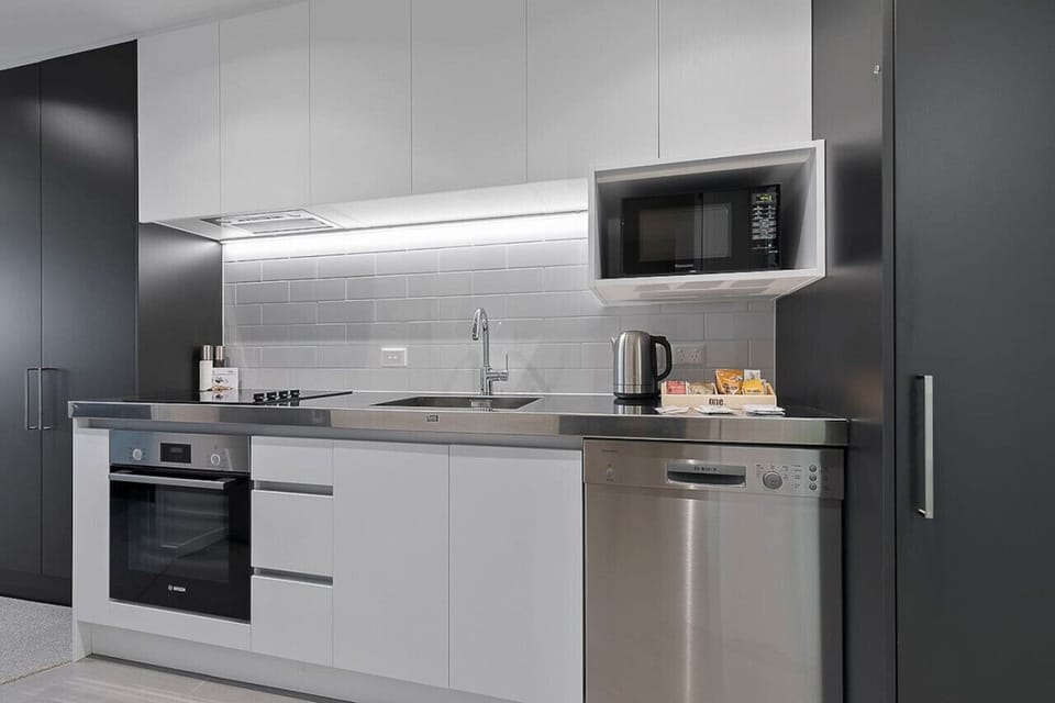 The kitchen has plenty of storage if you want to stay longer.