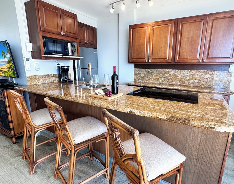 Tropical charm meets modern elegance in this inviting dining space.