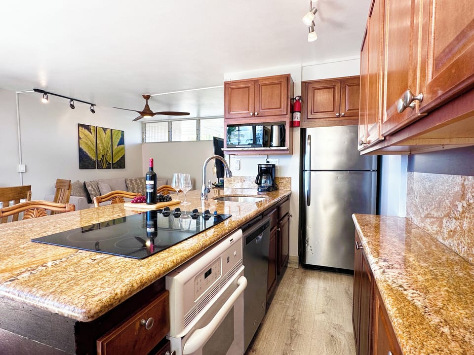 Modern elegance meets functionality in this open kitchen with stunning details.