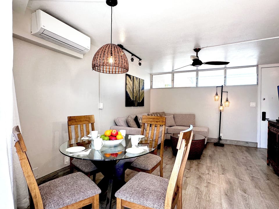 Gather around this stylish dining table perfect for savoring local Hawaiian flavors.