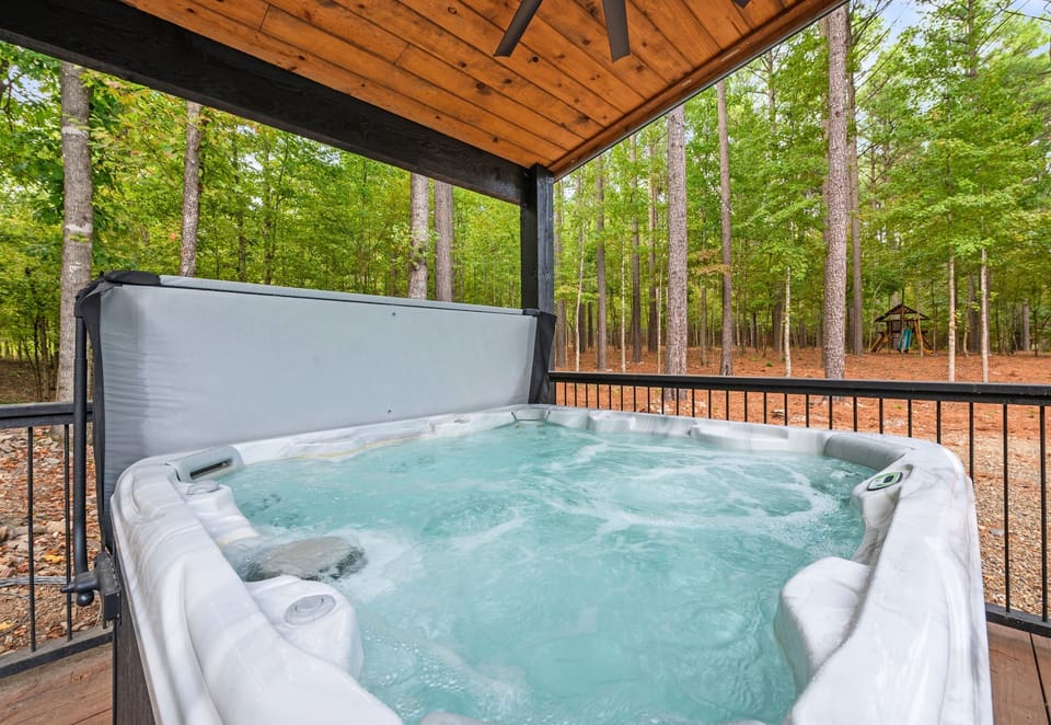 Let the warmth of the hot tub melt away your stress as you take in the peaceful forest surroundings.