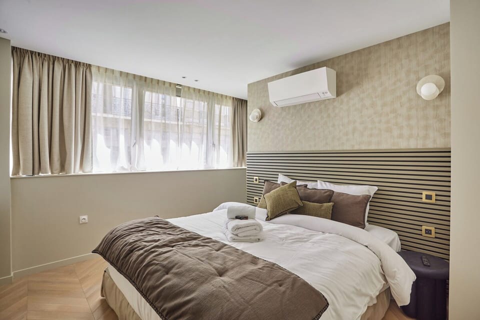 Apartment | Laptop workspace, iron/ironing board, bed sheets