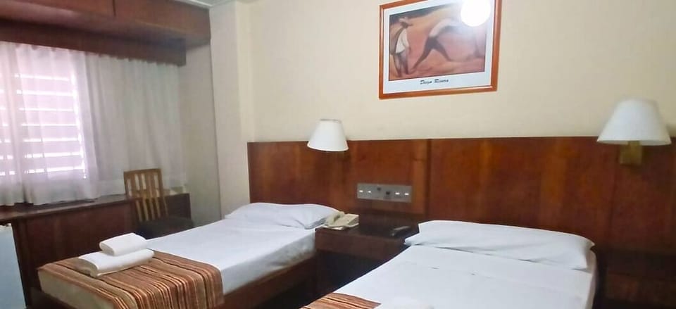 Standard Twin Room | Bathroom | Combined shower/tub, bidet, towels, soap