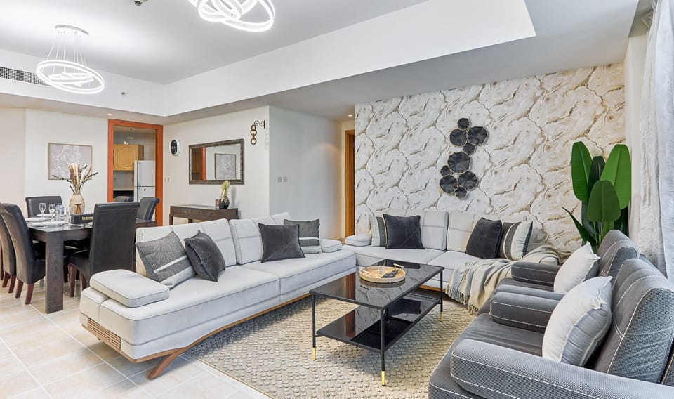 Premium Apartment, 4 Bedrooms | Living room | 55-inch flat-screen TV with cable channels