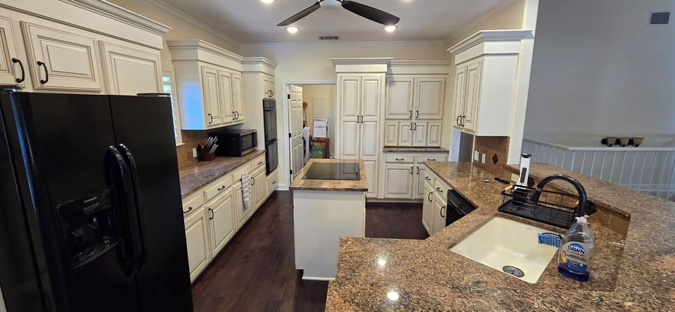 Fully stocked kitchen with two refrigerators