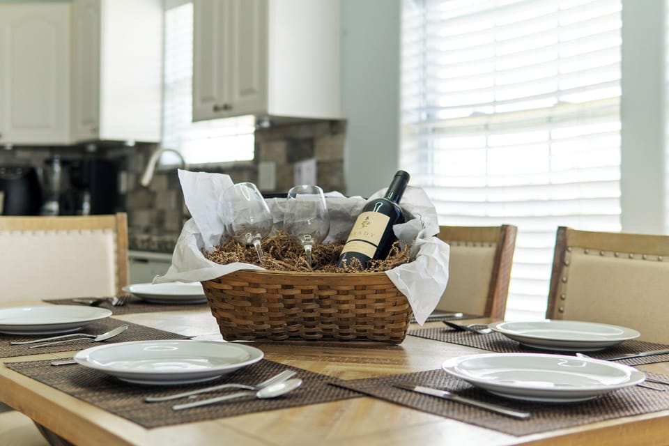 Open concept kitchen with dining room table.