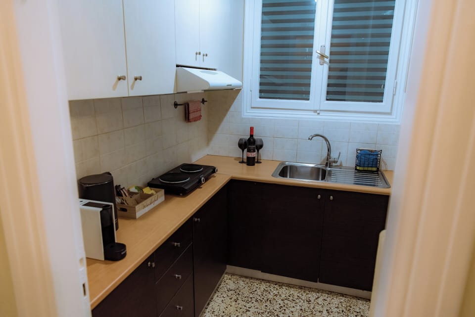 Apartment | Private kitchen | Full-size fridge, stovetop, espresso maker, coffee/tea maker