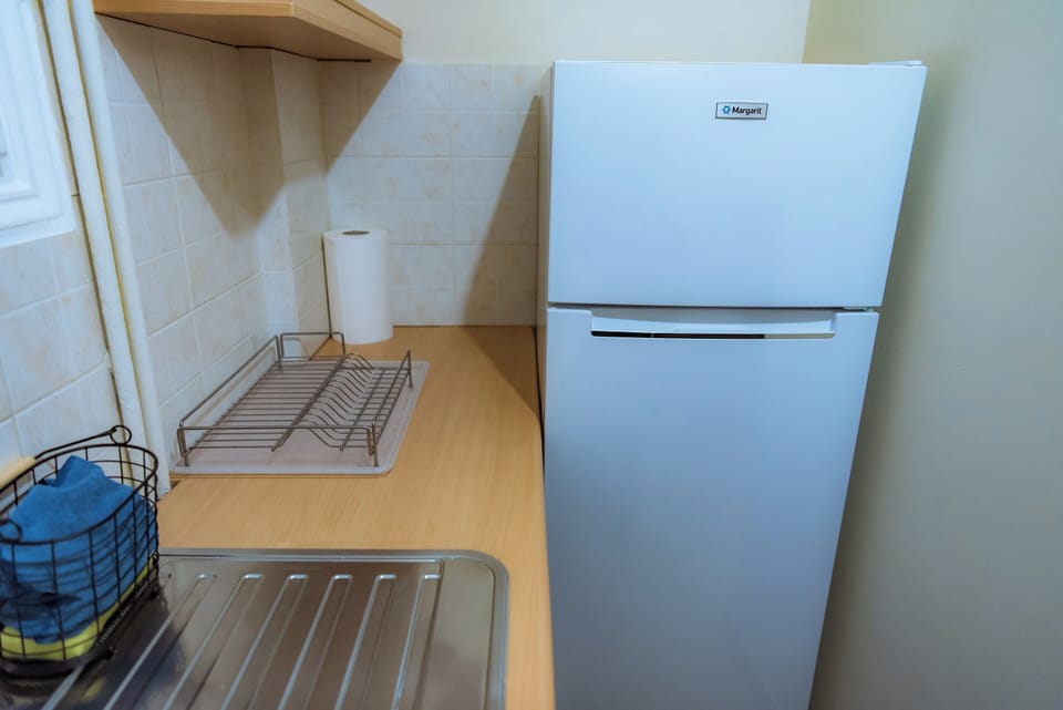 Apartment | Private kitchen | Full-size fridge, stovetop, espresso maker, coffee/tea maker