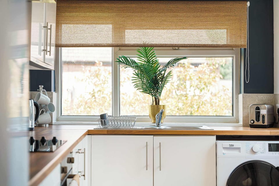 Enjoy the convenience of a fully equipped kitchen complete with a fridge, freezer, oven, hob, microwave, kettle, toaster, and washing machine. It also features plates, bowls, glasses, cutlery, cookware, and essential cooking utensils.