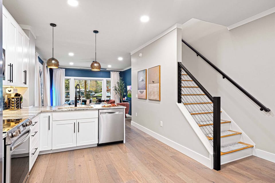 The bright, airy kitchen invites you in with its open layout, perfect for gathering and meal prep.