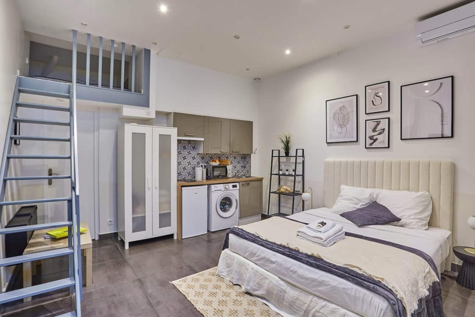 Apartment | Laptop workspace, iron/ironing board, bed sheets
