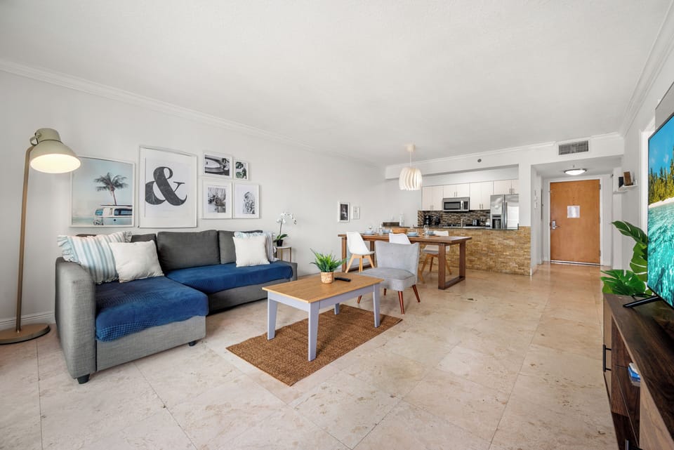 Luxury Apartment, Balcony, City View | Living area | 40-inch LED TV with cable channels