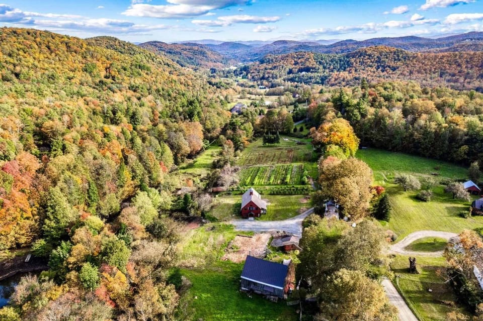 Aerial of the working farm and surrounding valley