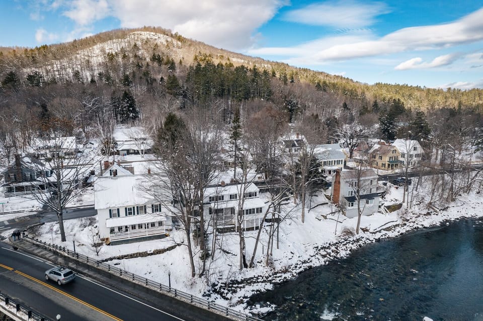 Aerial winter view of Woodstock Village along the Ottauquechee River
