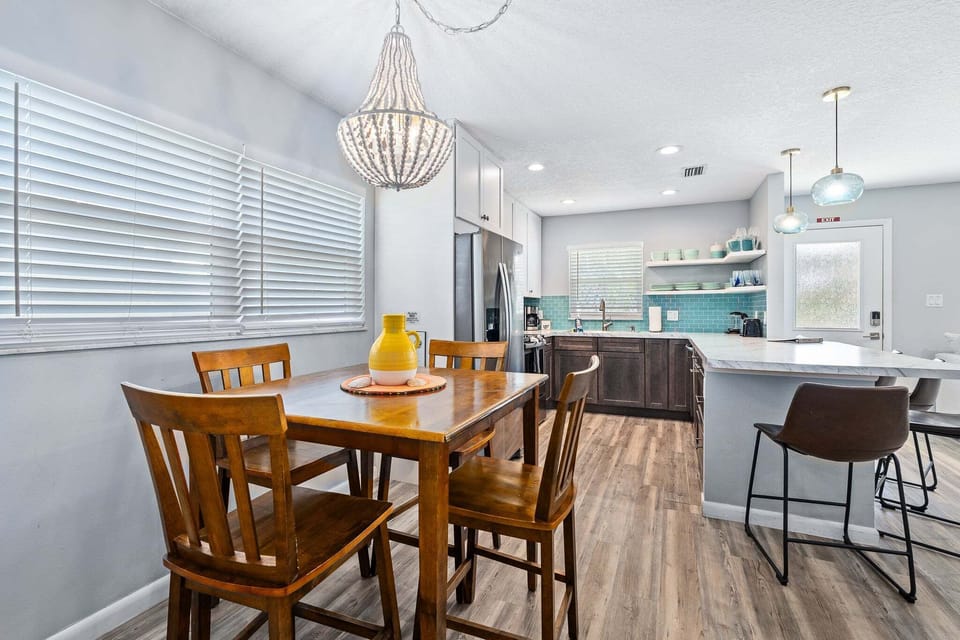The dining area is a convenient spot for meals, conversation, and enjoying time together.