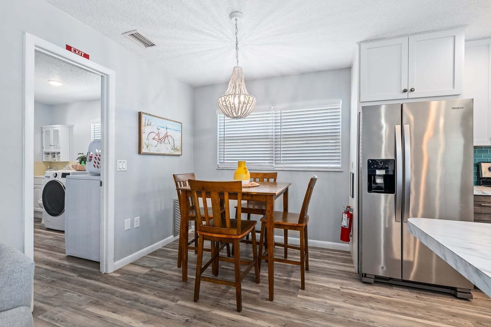 The dining area sits just off the kitchen and comfortably seats four.