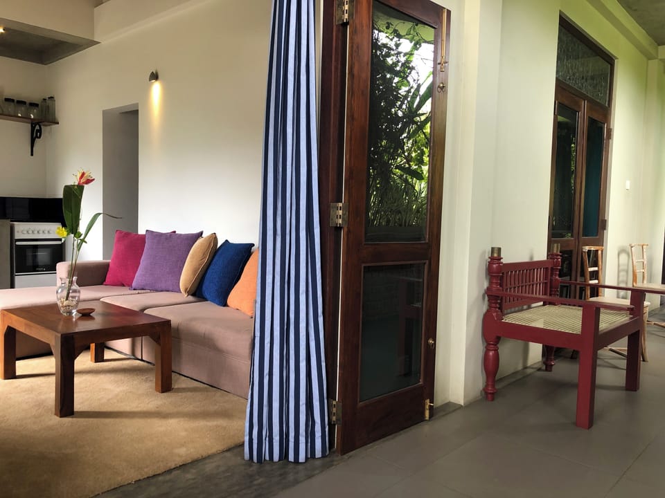 Deluxe Apartment | Living area | TV