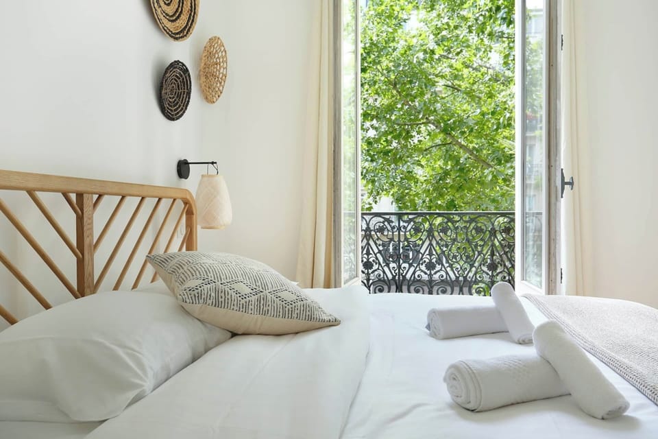 Apartment | Laptop workspace, iron/ironing board, bed sheets