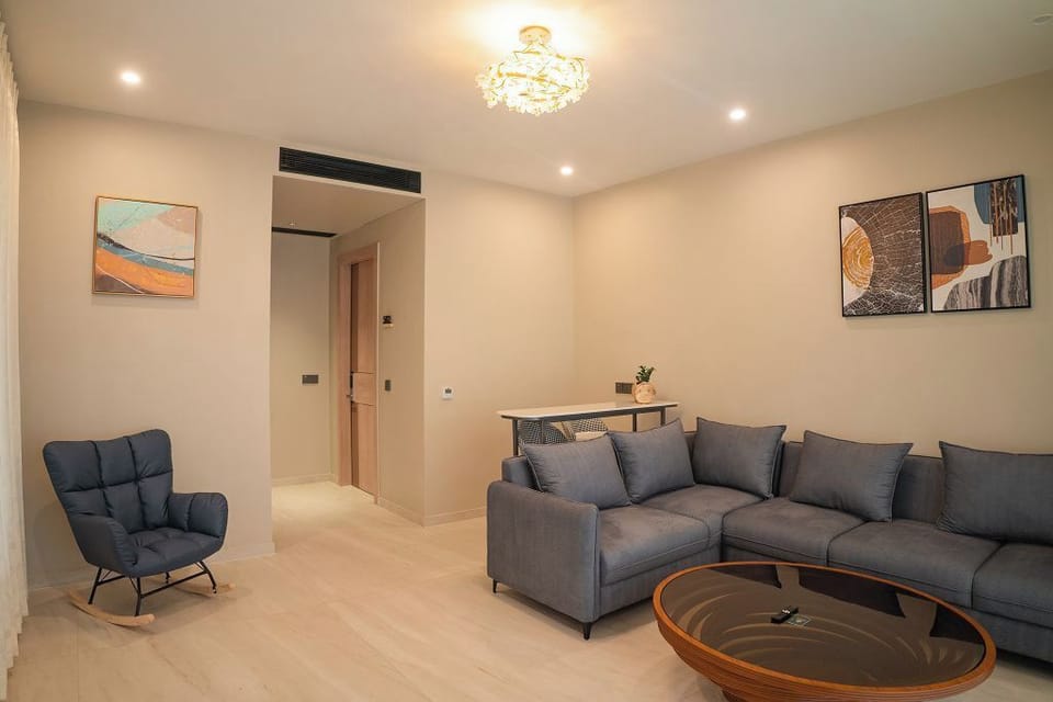 Premium Double Room, 2 Bedrooms, Garden View | Living area | 43-inch LED TV with digital channels