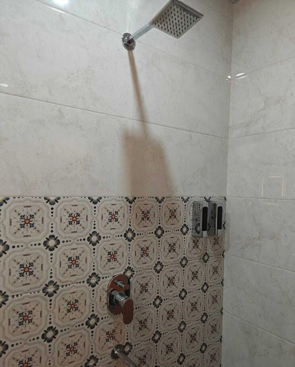 Shower, towels, soap, shampoo