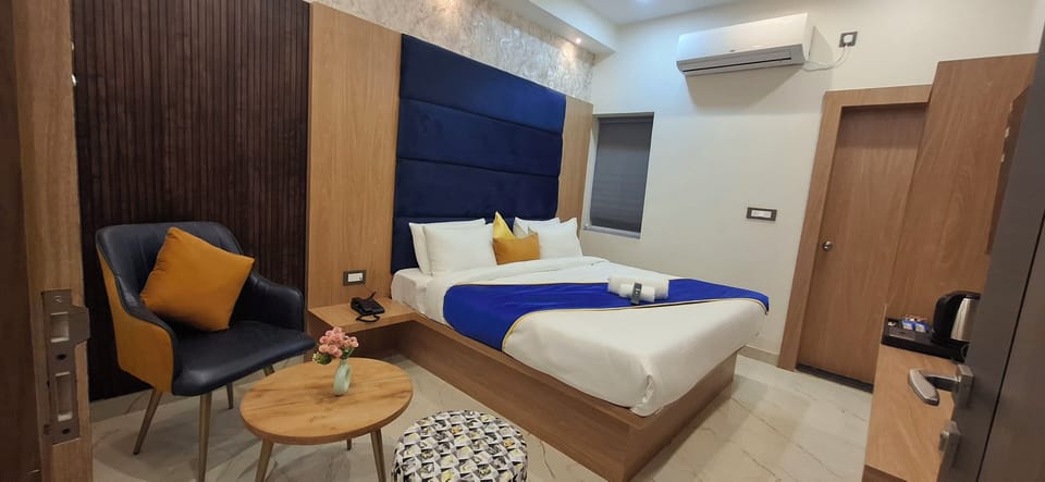 Deluxe Double Room, City View | Premium bedding, desk, laptop workspace, blackout drapes