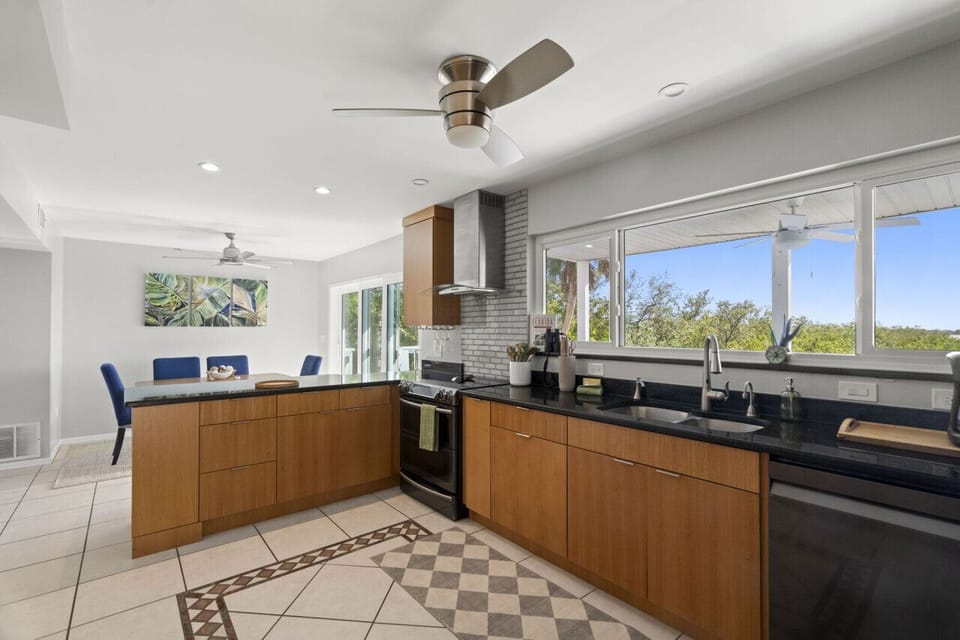 Prepare your favorite meals in a fully stocked kitchen while enjoying scenic views that make every meal feel special.