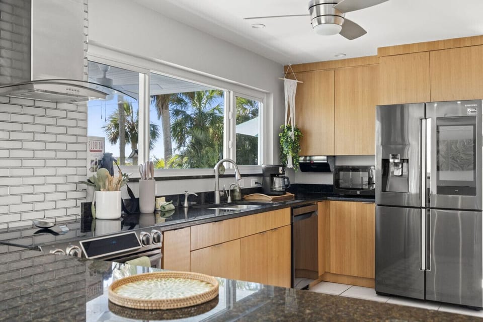 Prepare your favorite meals in a fully stocked kitchen while enjoying scenic views that make every meal feel special.