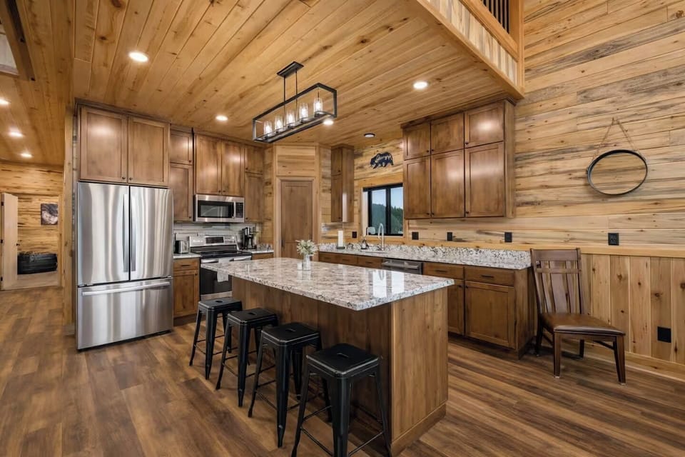 Open-concept kitchen with appliances and spacious countertops