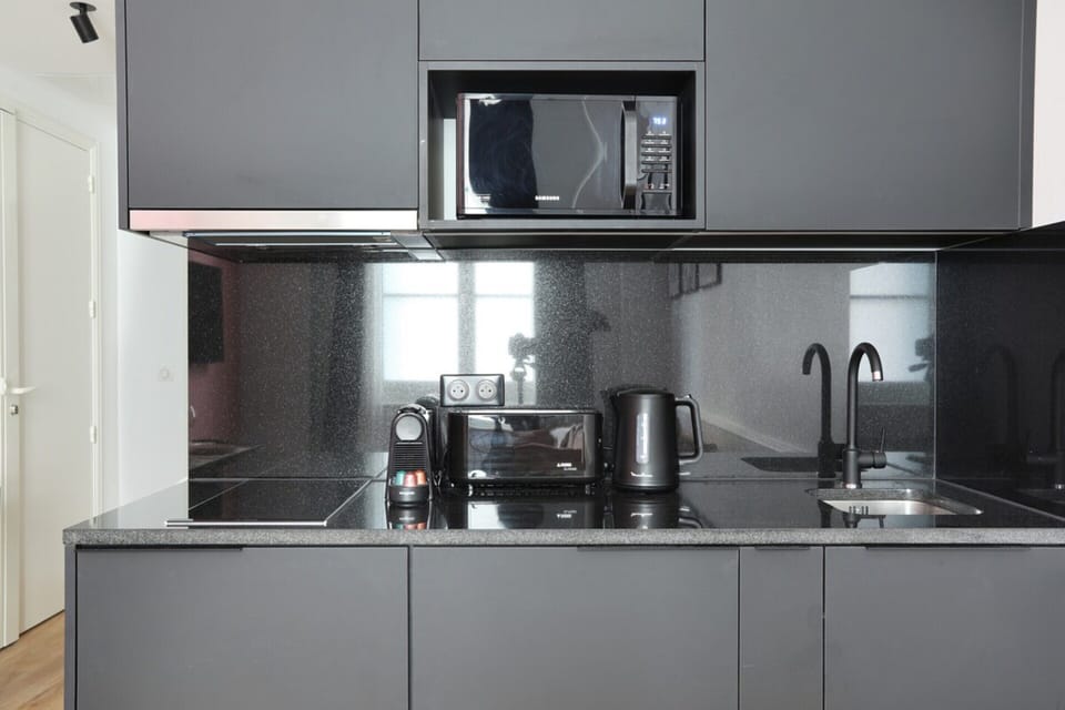 Apartment | Private kitchen | Cleaning supplies